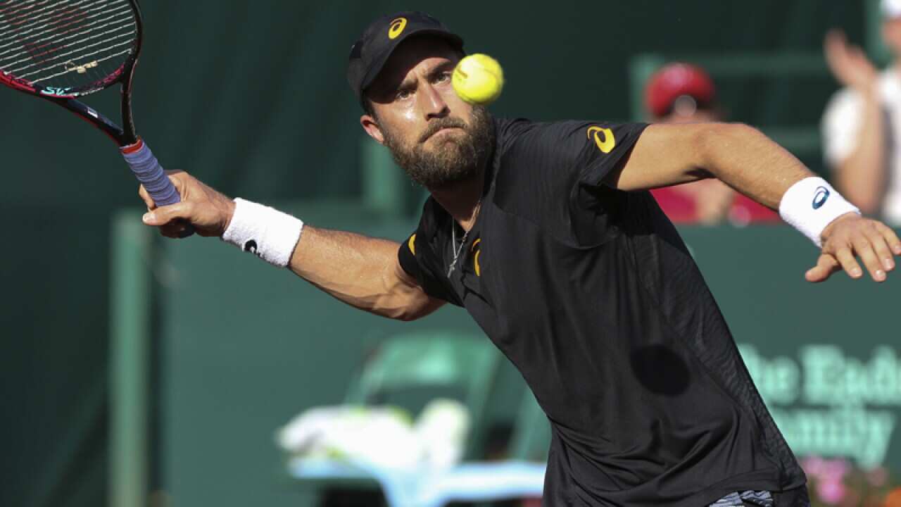 Steve Johnson, of the United States