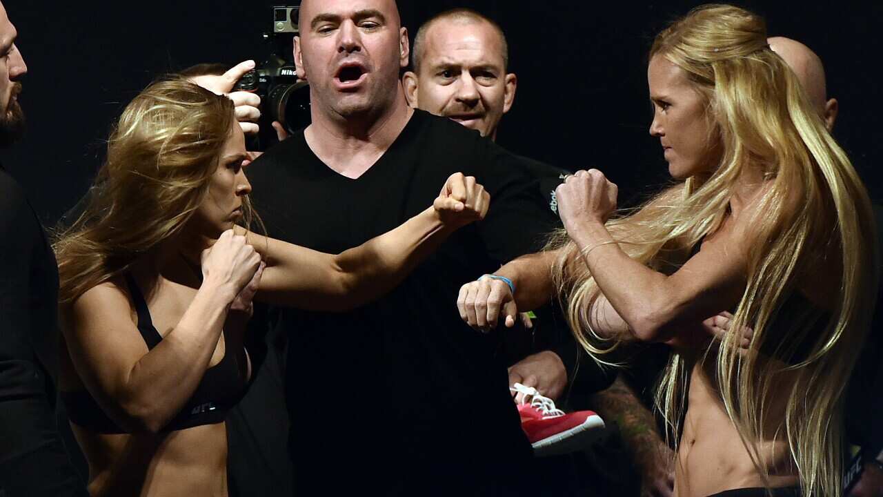 Ronda Rousey (left) and Holly Holm