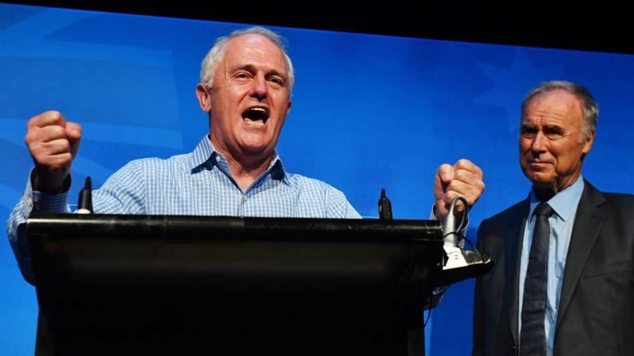 A relieved Malcolm Turnbull has retained his majority thanks to John Alexander's win in Bennelong.