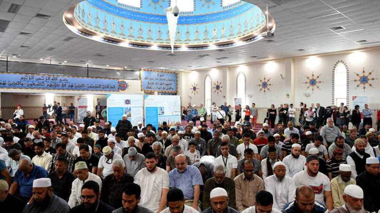 Men are seen during prayer at the Lakemba Mosque in south west Sydney. (AAP)