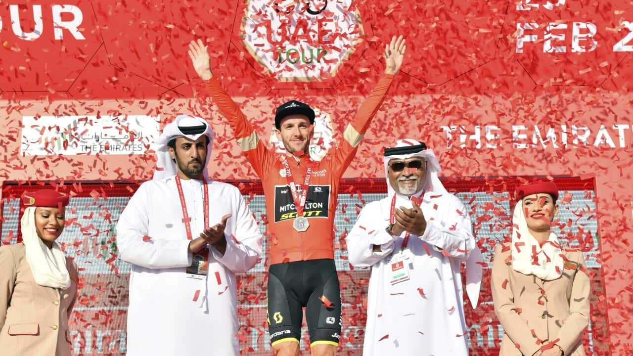 Britain's Adam Yates celebrates winning the third stage of the tour of United Arab Emirates cycling race, from Al Qudra Cycle Track to Jebel Hafeet, Tuesday, Feb. 25, 2020. (Massimo Paolone/LaPresse via AP)