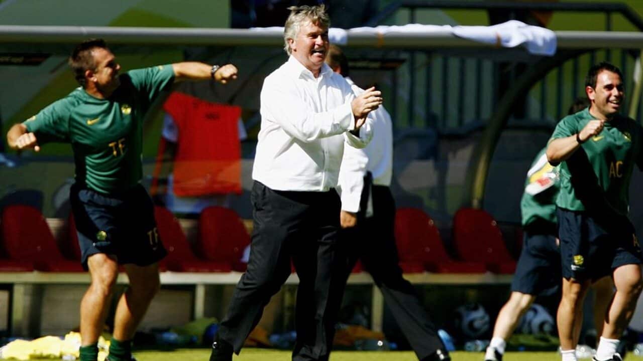 Guus Hiddink celebrates the Socceroos' victory over Japan in 2006
