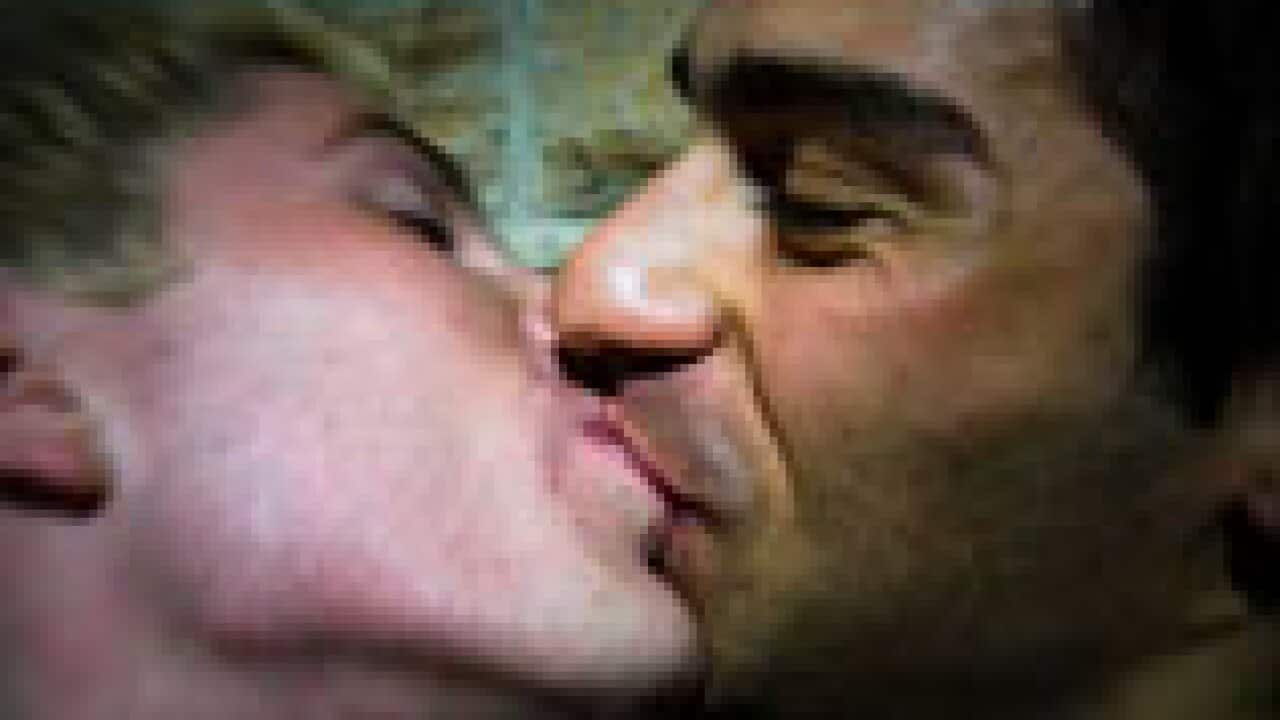 gay_men_kiss_091218_S_aap_77224853