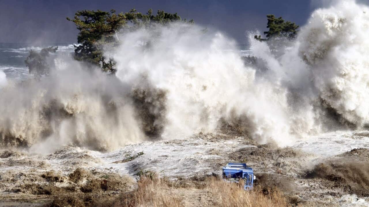 Tsunami waves hitting the coast of Minamisoma in Fukushima prefecture March 11, 2011