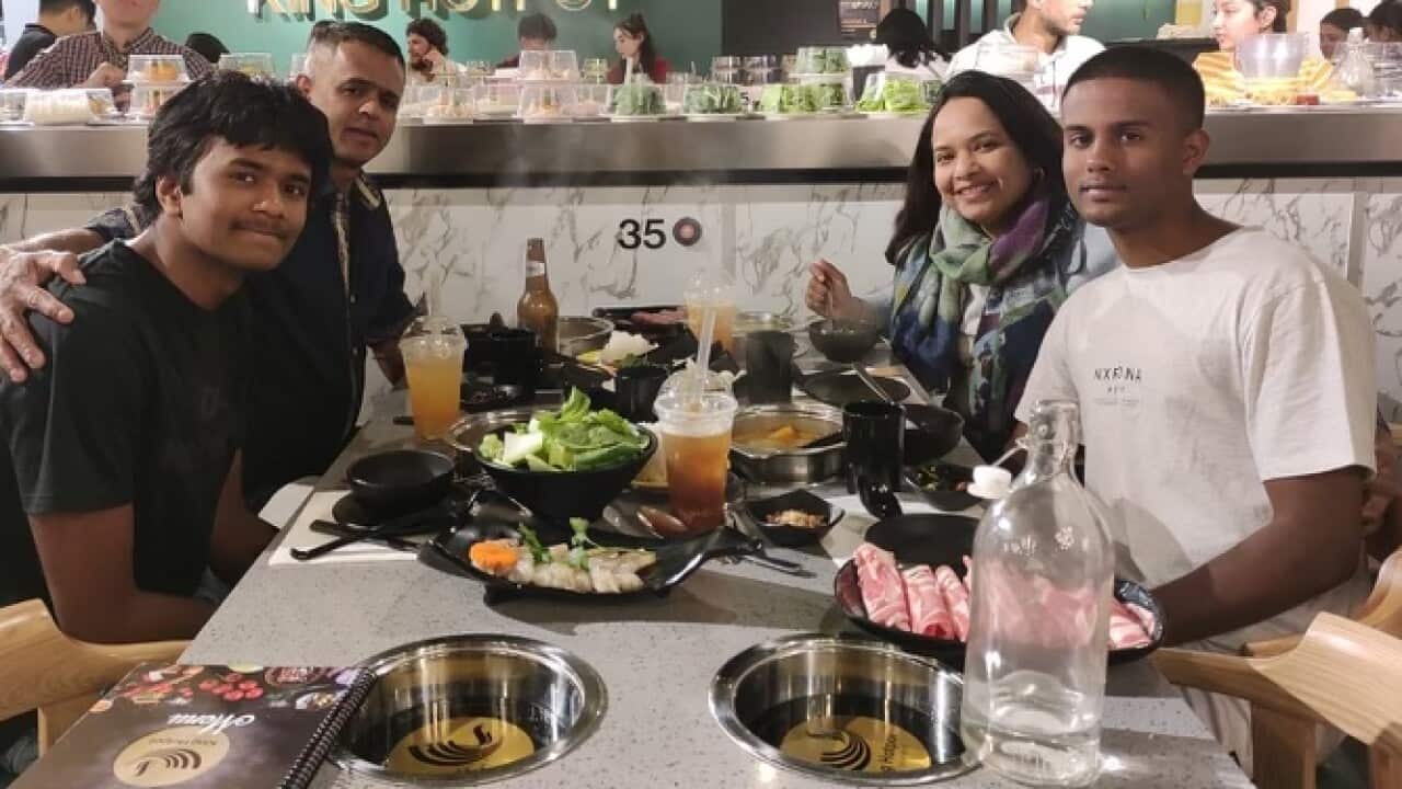 Rita Pinto with one of her sons.