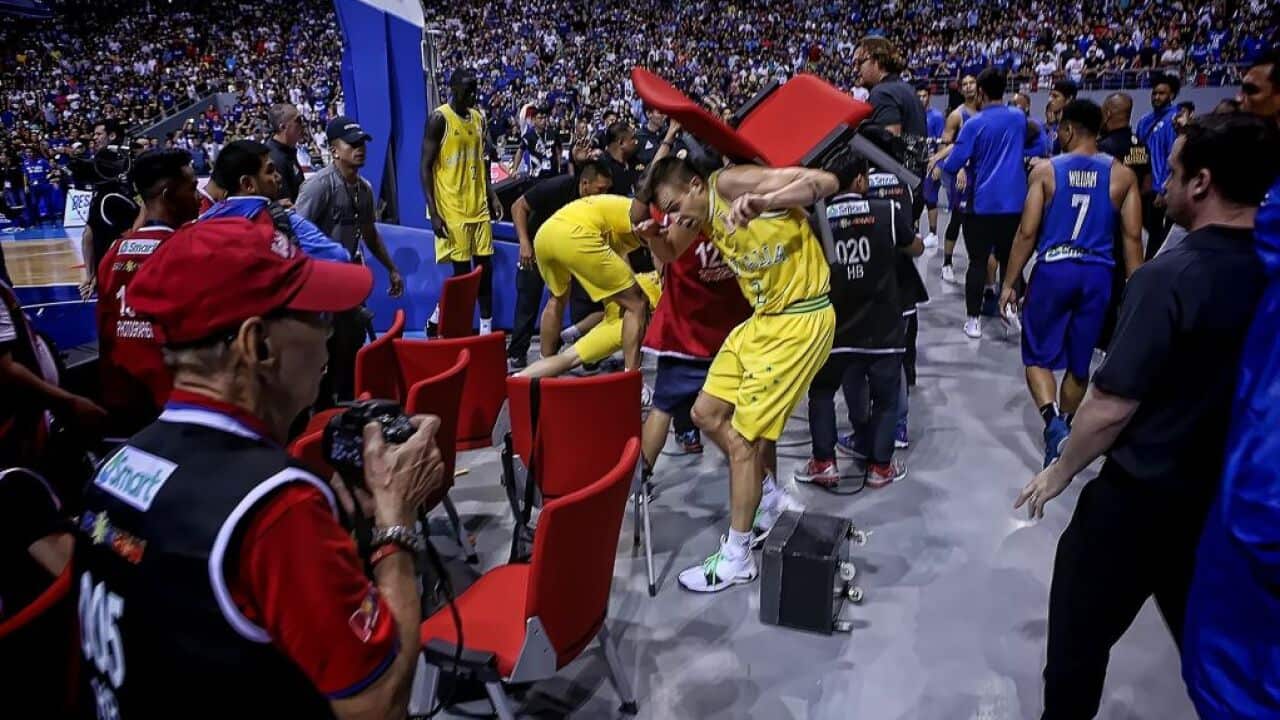 Philippine and Australian players during their FIBA World Cup Asian qualifier.