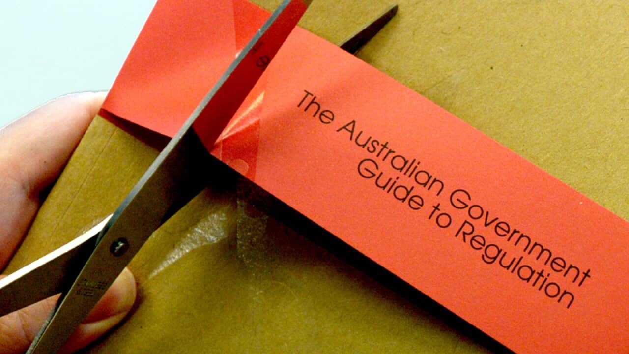 Photo of red tape cutting