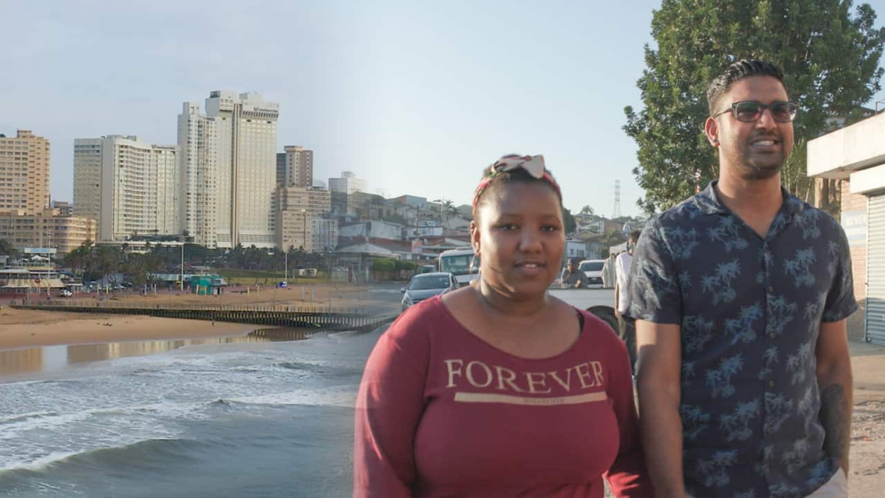 A young Black and Indian couple.