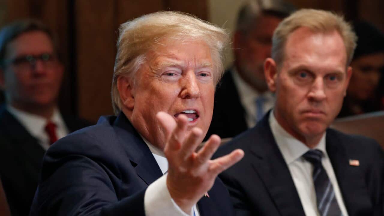 President Donald Trump alongside Deputy Secretary of Defense Patrick Shanahan (AAP)