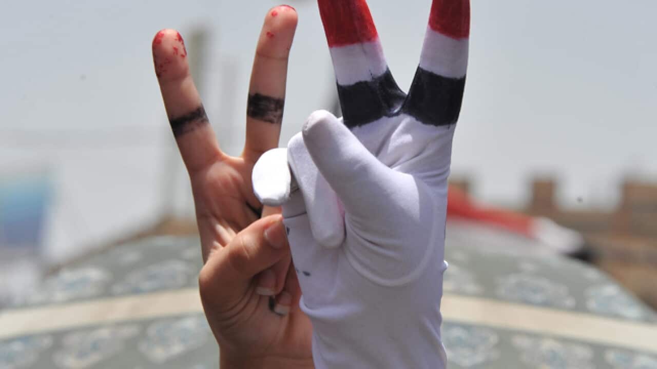 yemen_unrest_protests_V-fingers_180411_B_AAP_235202107