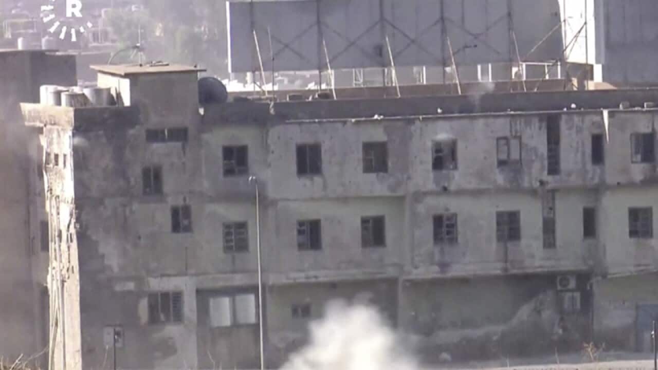 A building where two militants are believed to be holed up in Kirkuk