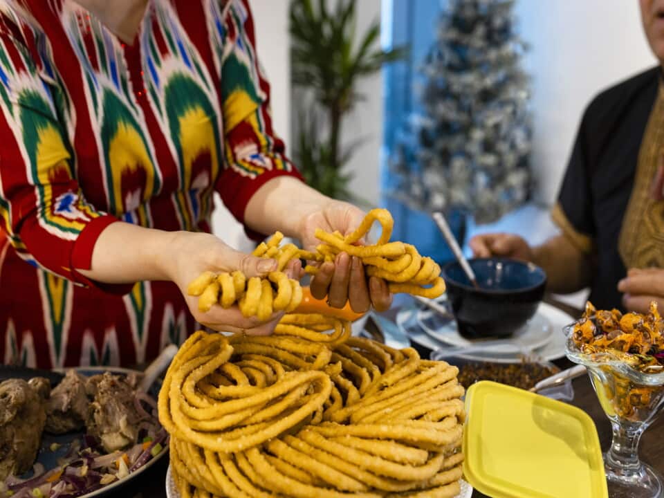 A Uyghur celebration of Eid al-Fitr usually features sangza: deep-fried noodles in a twisted pyramid shape.