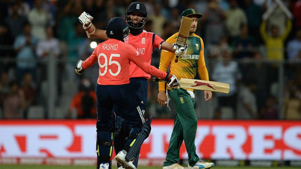 Moeen Ali of England celebrates hitting the winning runs with Adil Rashid
