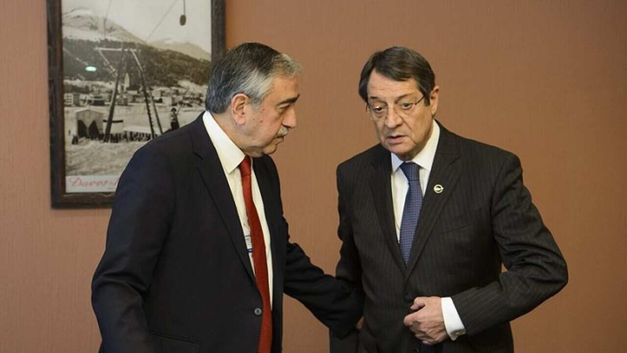 Greek Cypriot President Nicos Anastasiades and Turkish Cypriot leader Mustafa Akinci
