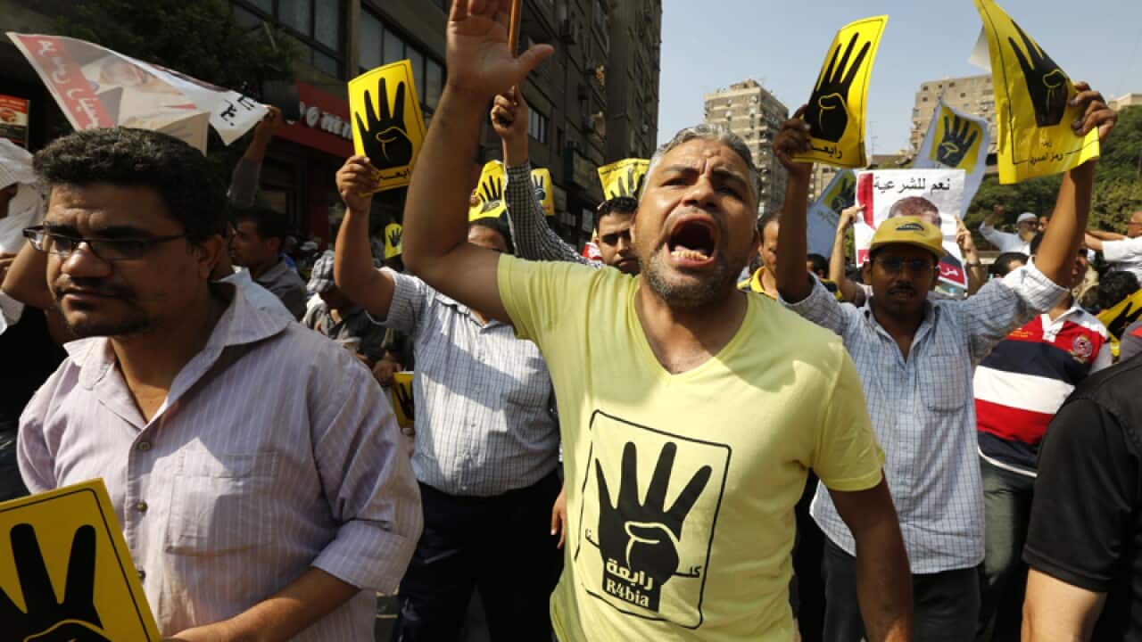 Supporters of the Muslim Brotherhood chant slogans in Cairo