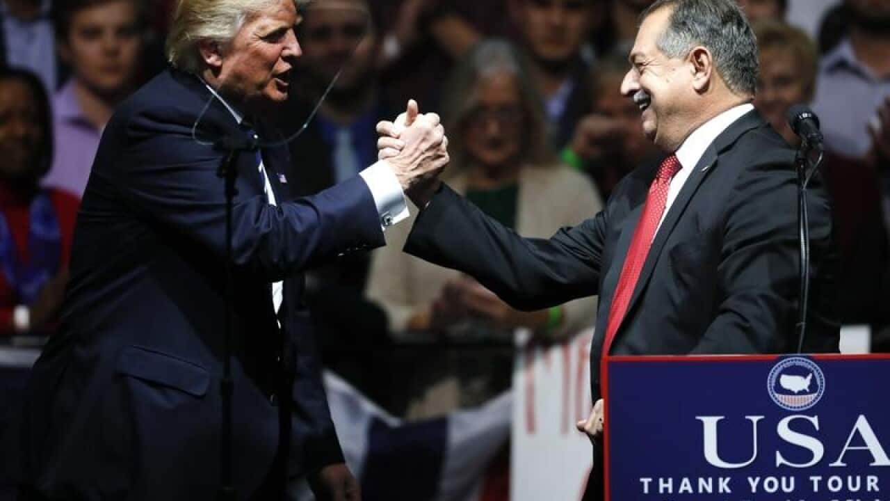 Donald Trump and Andrew Liveris