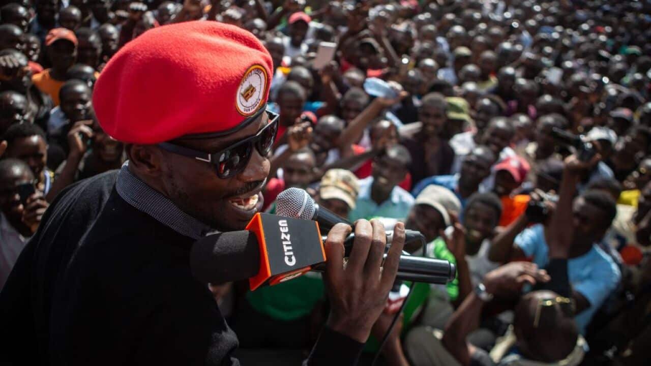 Ugandan politician Robert Kyagulanyi, better known as pop star Bobi Wine, speaks to people at Kibera slum in Nairobi, on October 14, 2018 during Kyagulanyi's five-day-visit in Kenya.