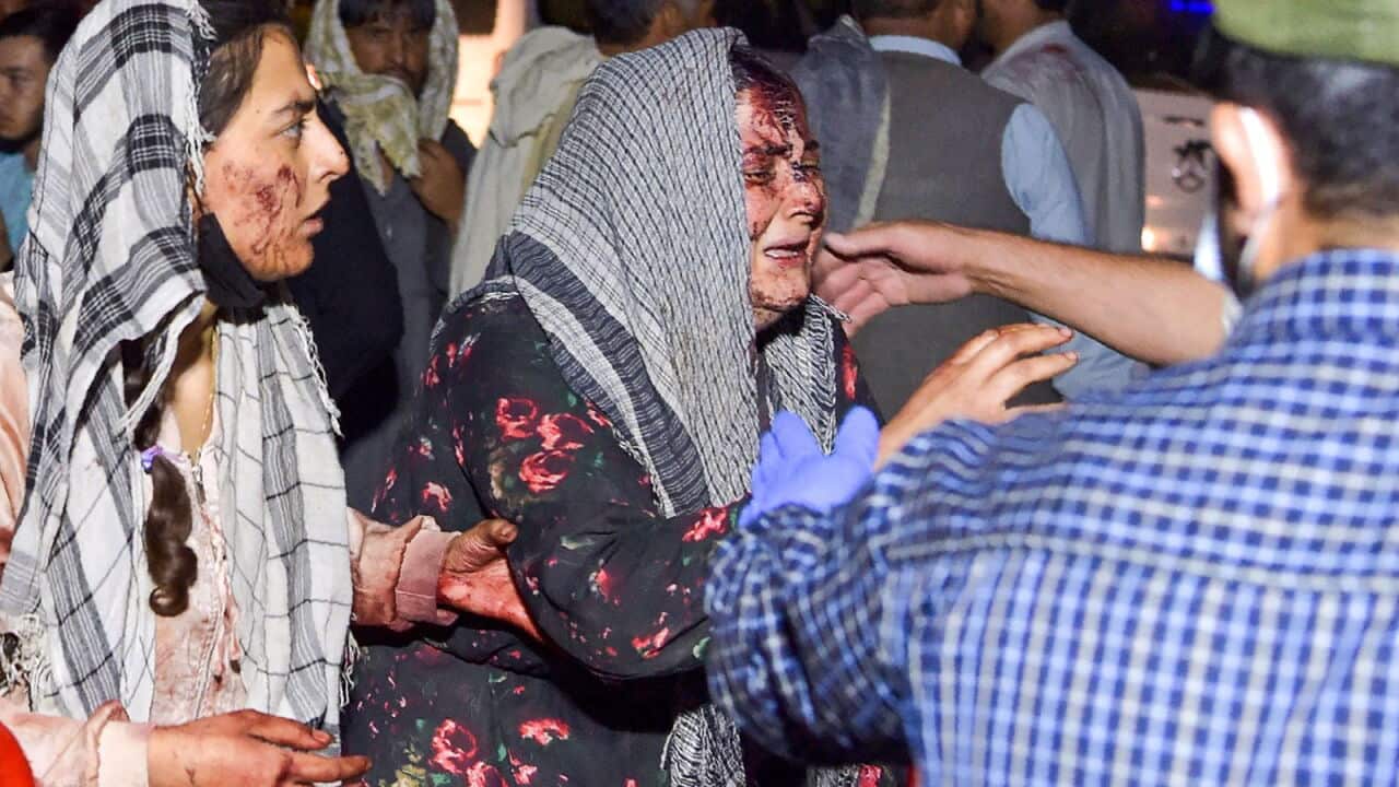 People stunned by bomb attack at Kabul Airport recently.