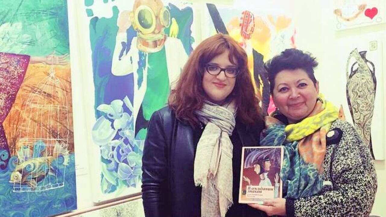 Sarah Bendentsky with the book cover artist Yelena Revis
