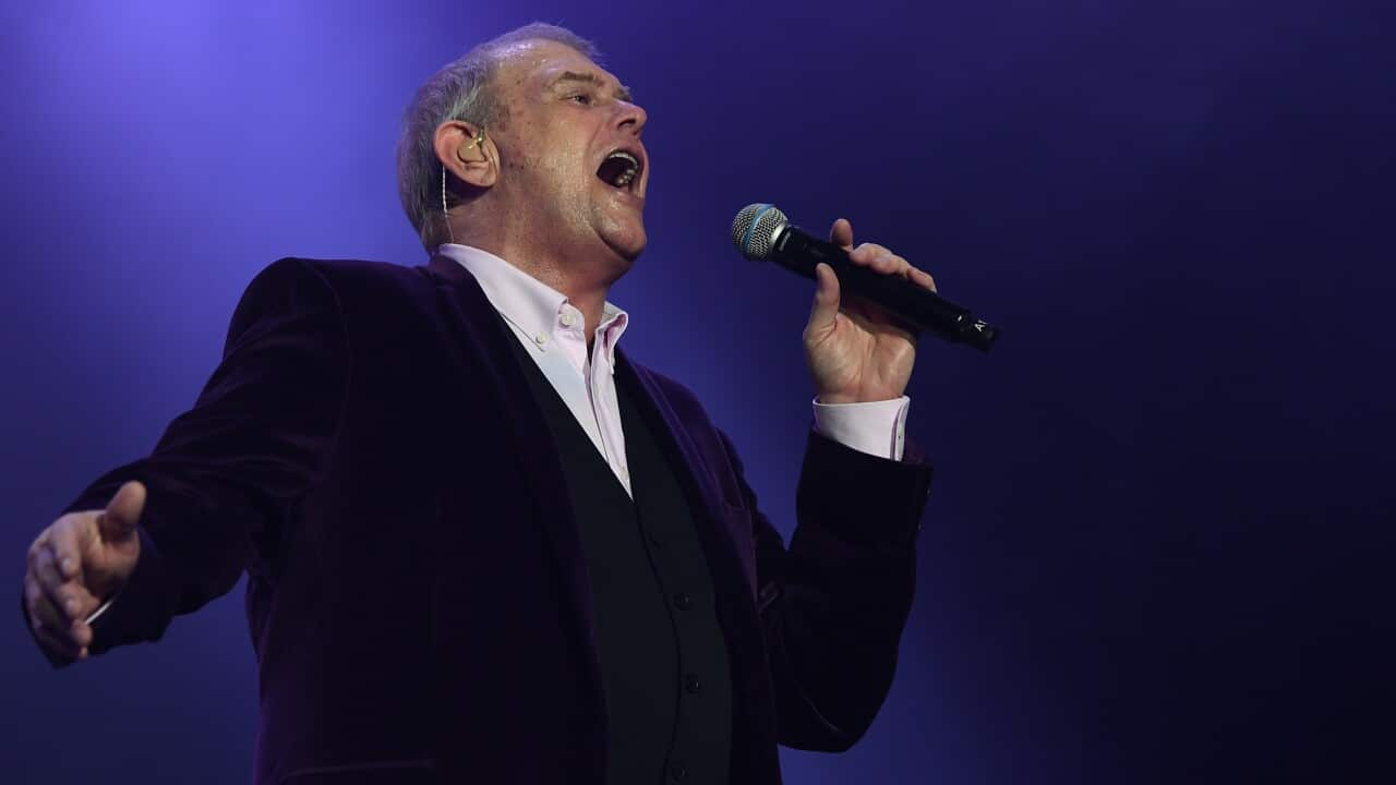 John Farnham performs during the Fire Fight Australia bushfire relief concert at ANZ Stadium in Sydney, Sunday, February 16, 2020. (AAP Image/Joel Carrett) NO ARCHIVING