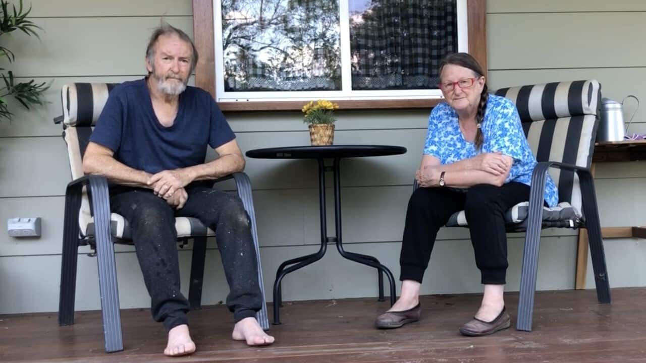 Judith and Paul Collins outside the house they rebuilt after the 2019 bushfires in Buxton, NSW.