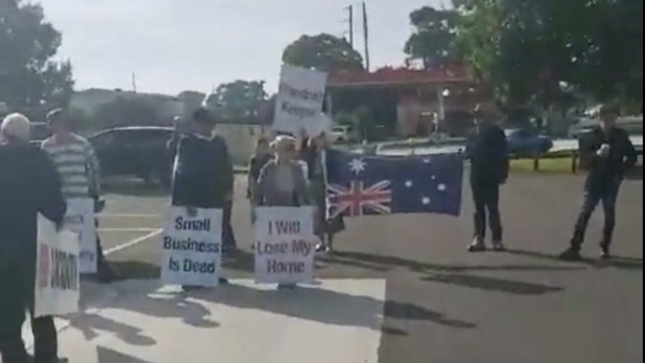 Protesters have gathered to protest against the government's lockdown rules.