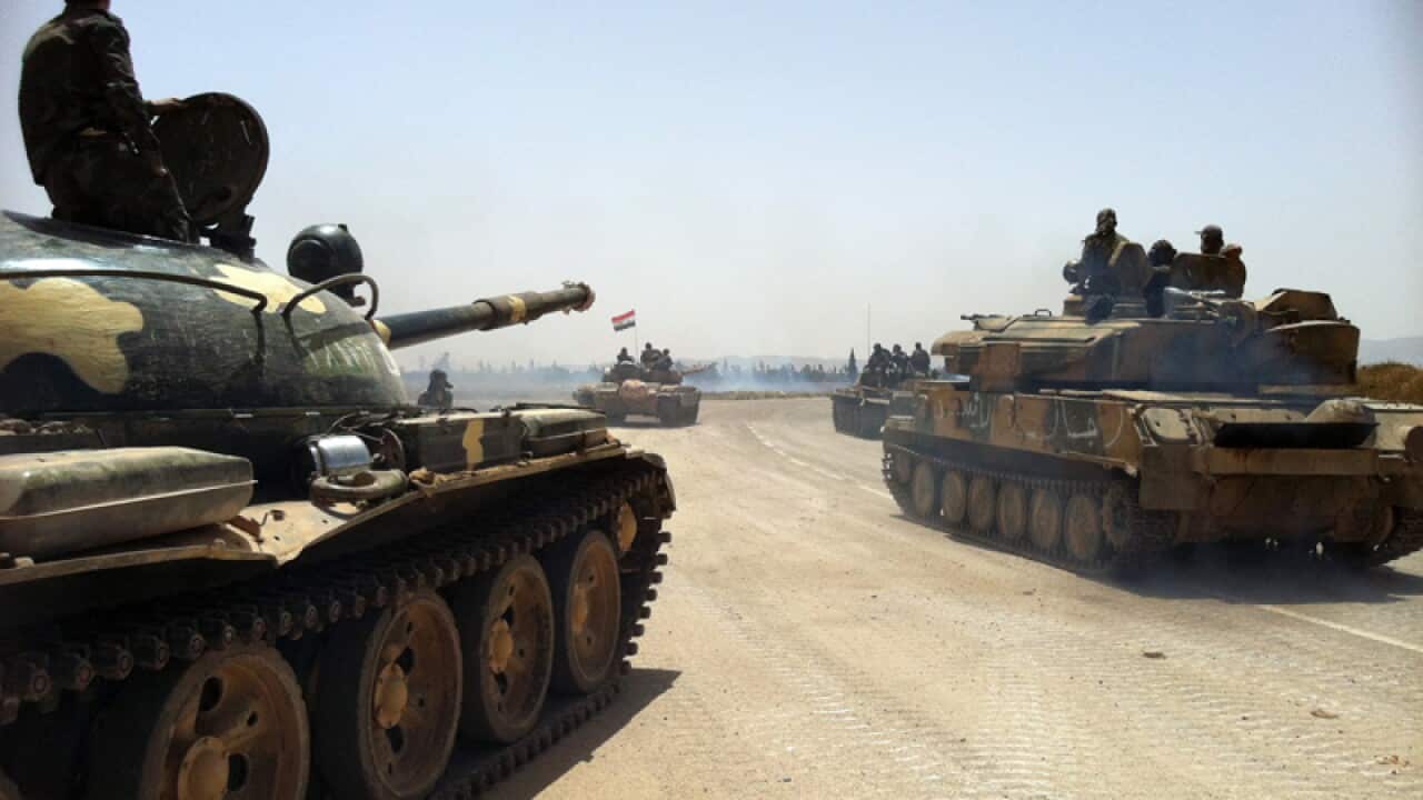 Missile kills 26 as key Syria battle rages
