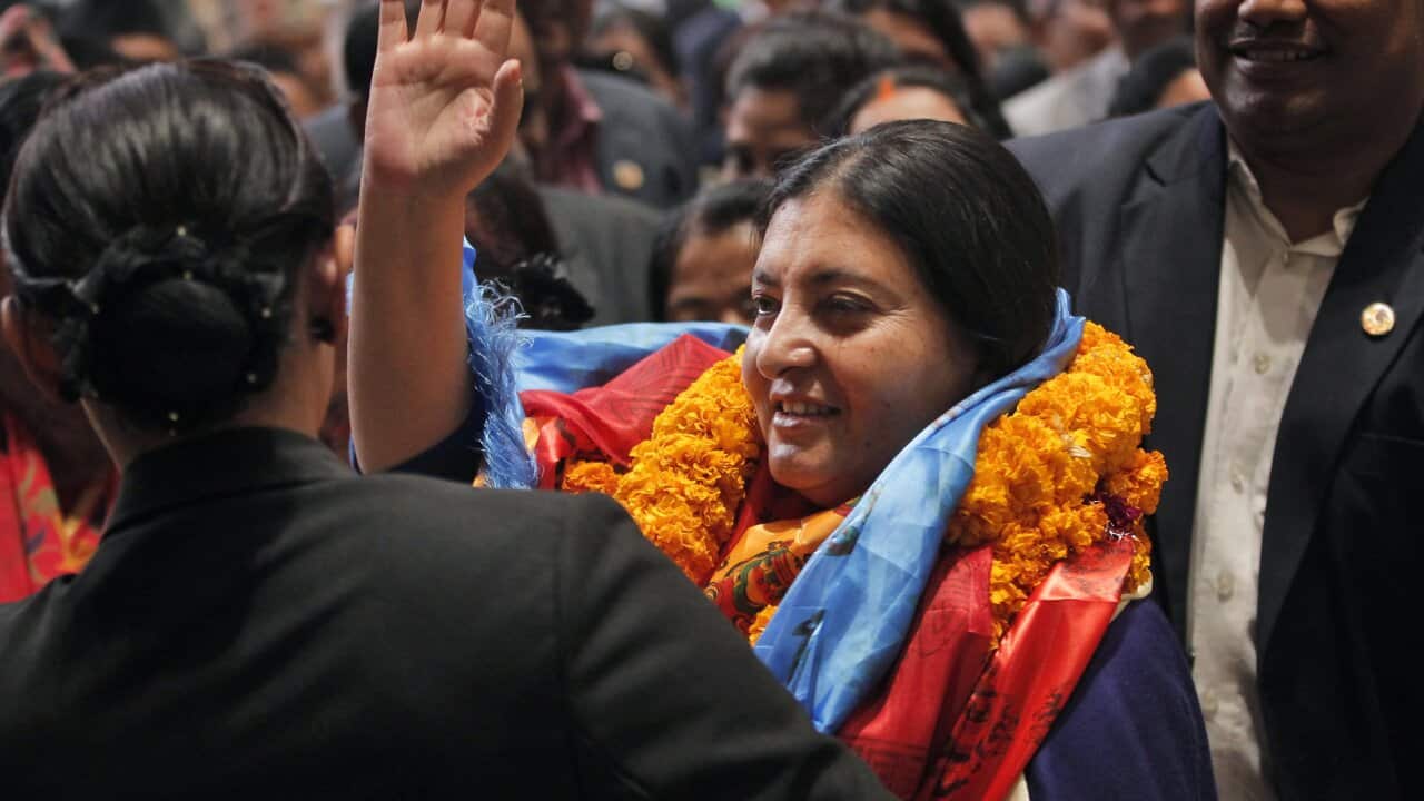 Bidhya Devi Bhandari of the Communist Party of Nepal Unified Marxist-Leninist waves her hand after she was elected as Nepal's new president in Kathmandu, Nepal, Wednesday, Oct. 28, 2015. (AP Photo/Niranjan Shrestha)