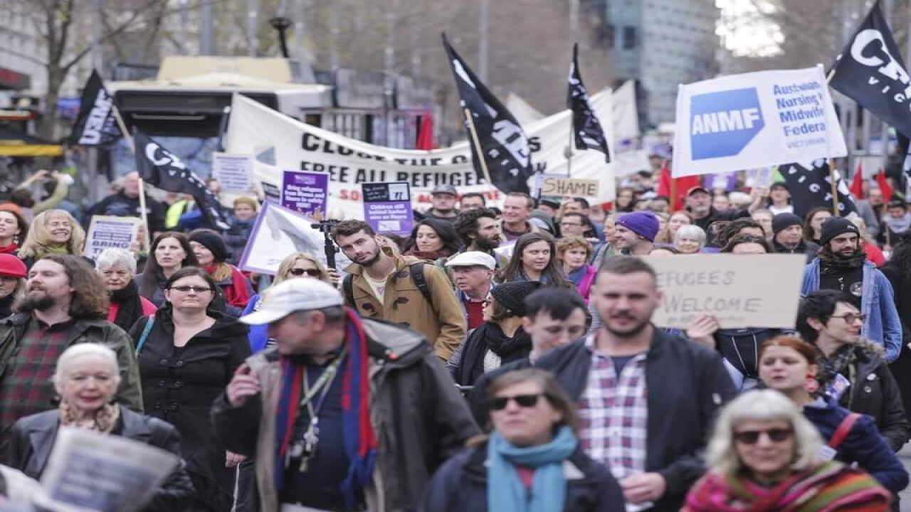 Protesters are seen in Melbourne.