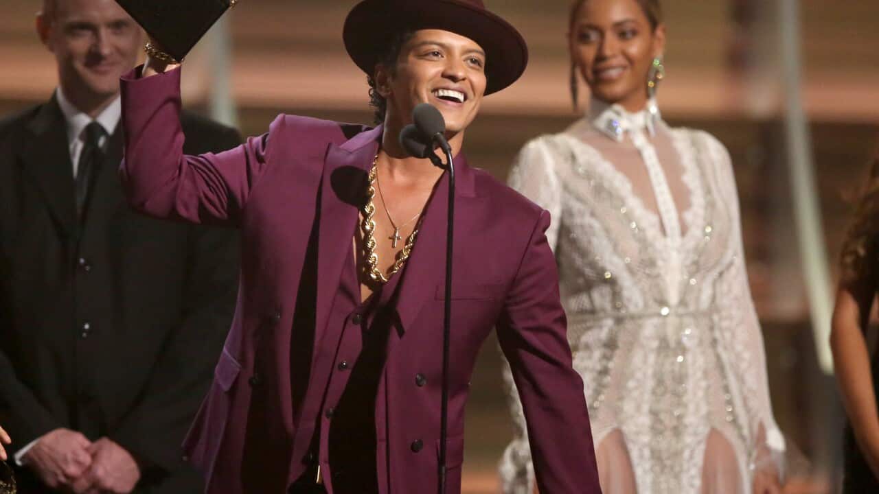 Bruno Mars accepts the award for Record of the Year