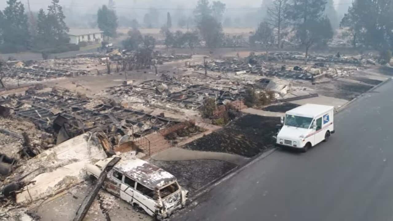 Drone footage captured of a U.S.P.S. postman delivering mail in wildfire ravaged Santa Rosa.