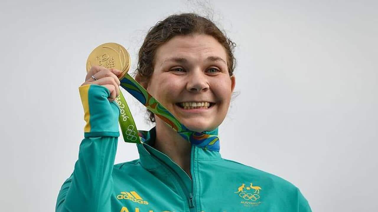 Gold medallist Australia's Catherine Skinner celebrates during the medal ceremony for the women's trap event at the Rio 2016 Olympic Games (Getty Images)
