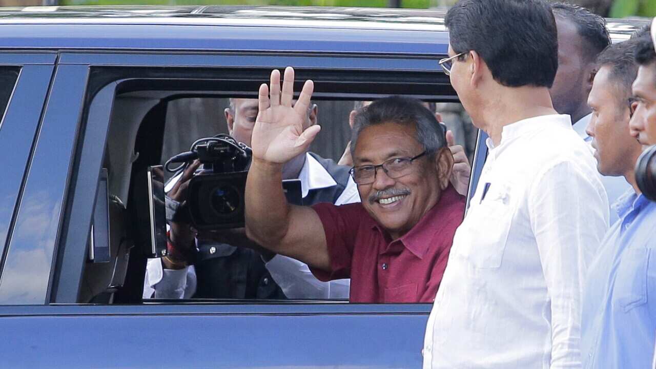 Sri Lanka's President-elect Gotabaya Rajapaksa waves to supporters
