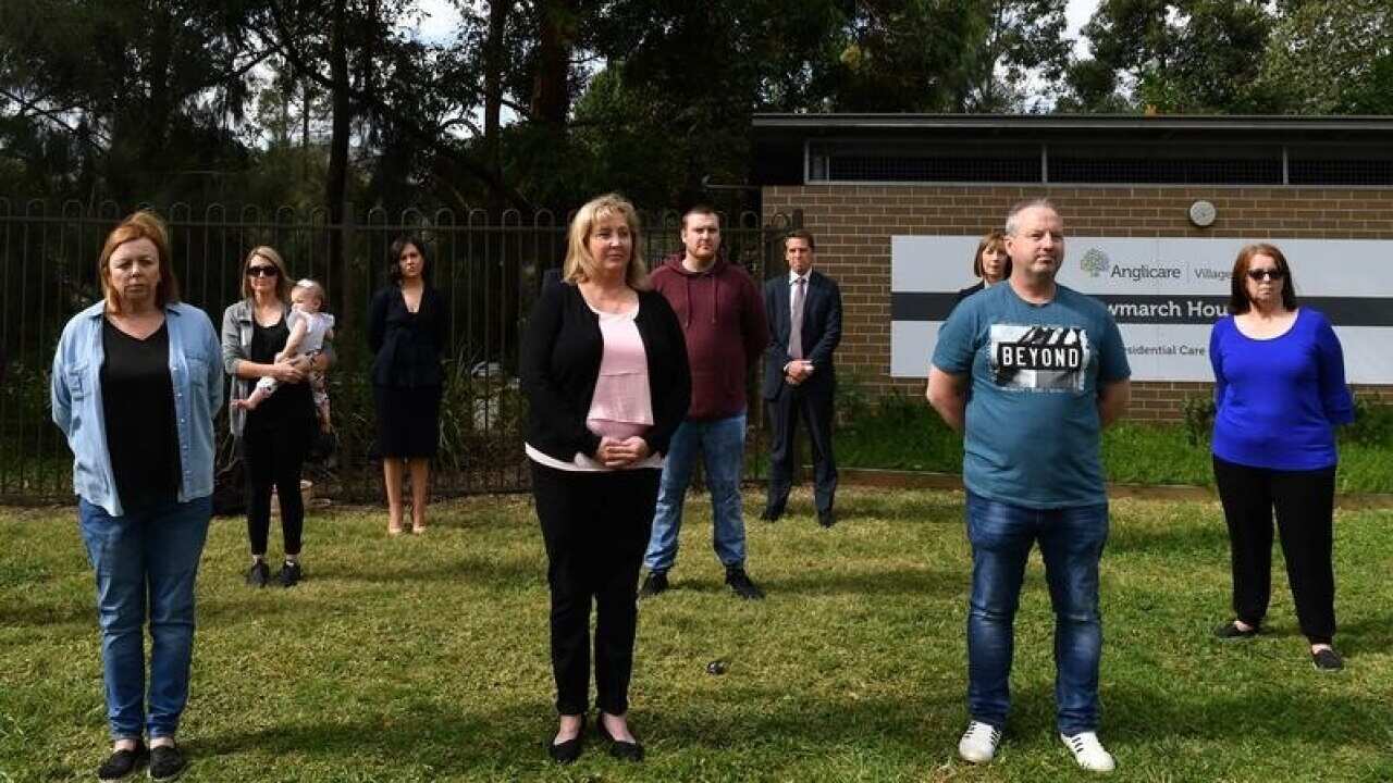 Family members of residents of Newmarch House outside the home.