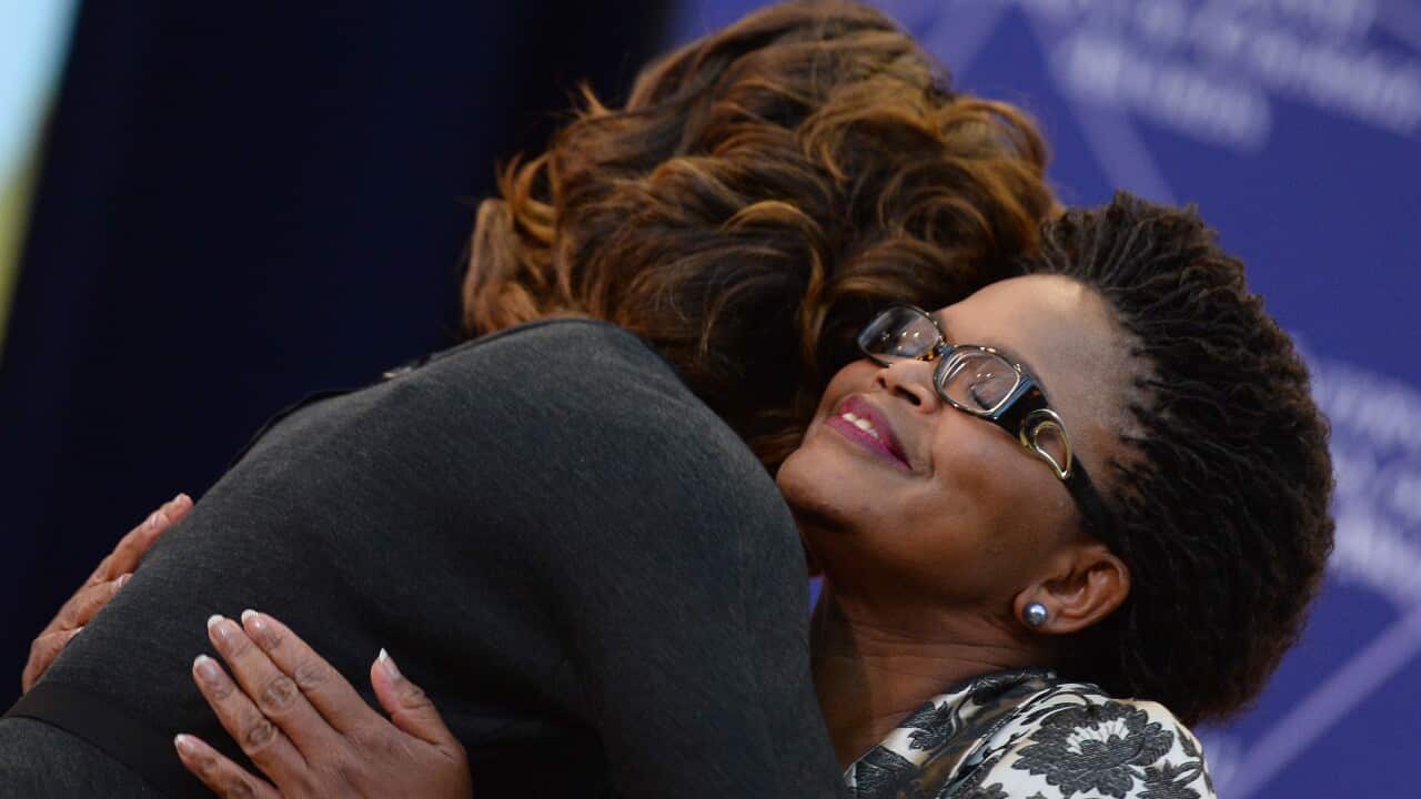 Zimbabwean lawyer Beatrice Mtetwa (r) meets Michelle Obama - Getty-1.jpg