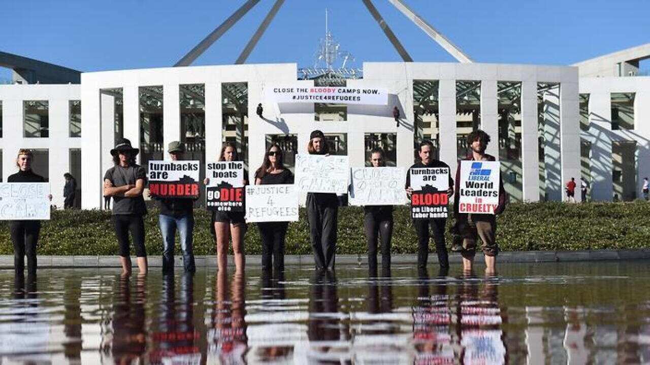 Protest outside Parliament House in Canberra