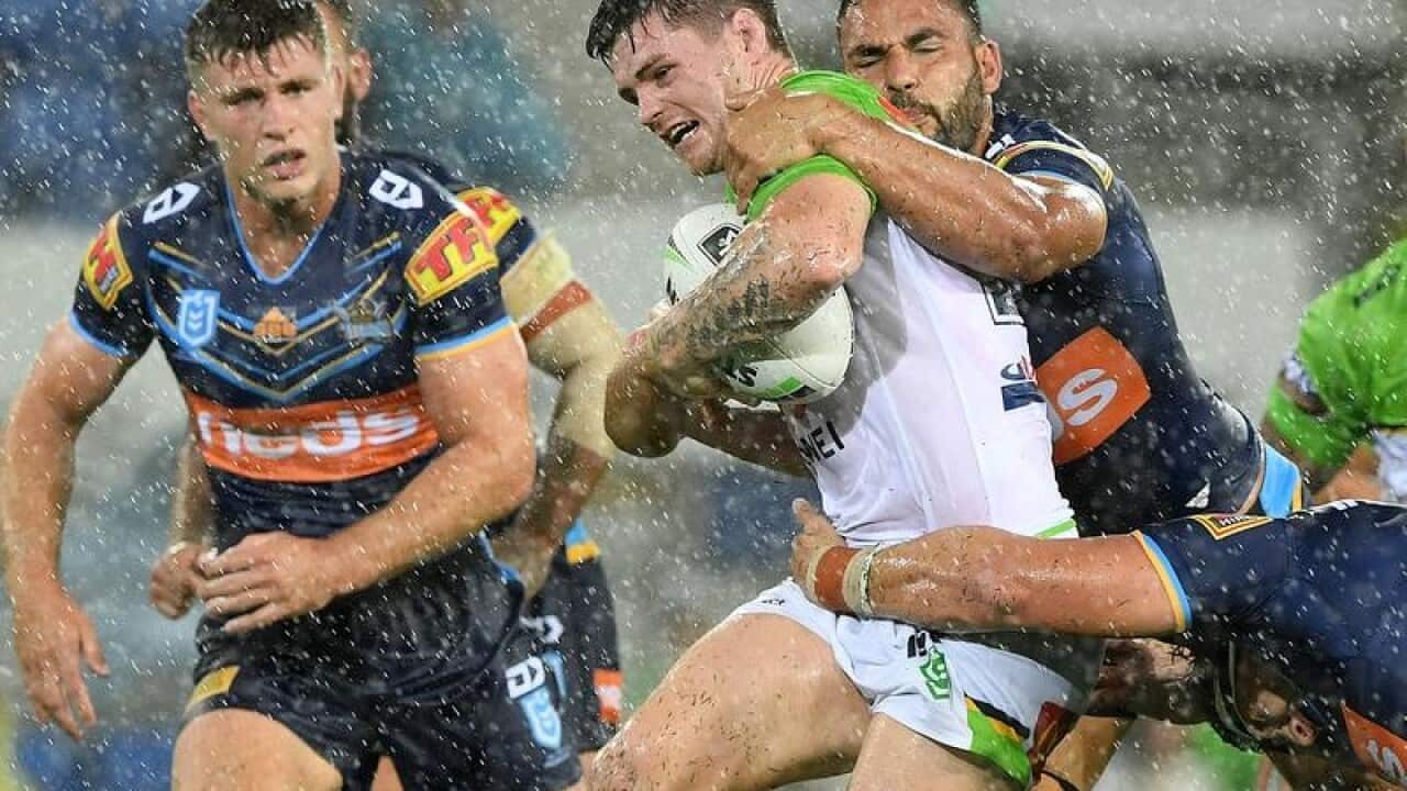 John Bateman (C) in action against the Gold Coast Titans