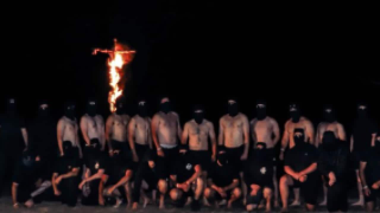 The alleged right-wing extremist group set fire to a cross during a visit to the Grampians National Park.