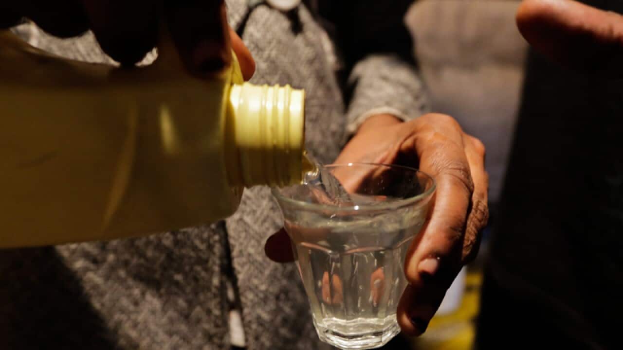 Distilled alcohol collected from one of the illegal brewing dens