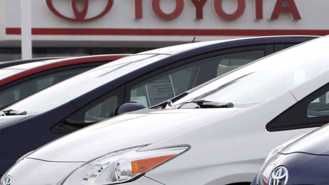 Prius sedans at a Toyota dealership