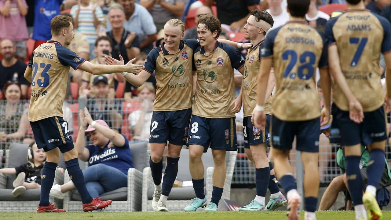 Jets players celebrate a goal to Lachlan Bayliss during the A-League Men Round 15 match between the Newcastle Jets and Brisbane Roar at McDonald Jones Stadium in Newcastle