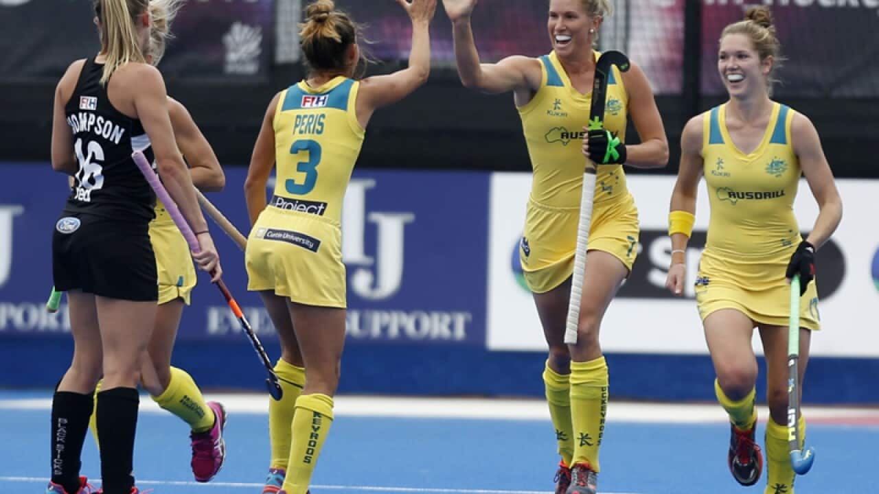Australia's Jodie Kenny (2R) celebrates scoring their second goal