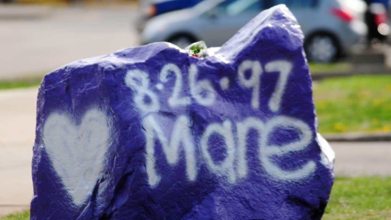 A rock spray-painted in memory of stabbing victim Maren Sanchez