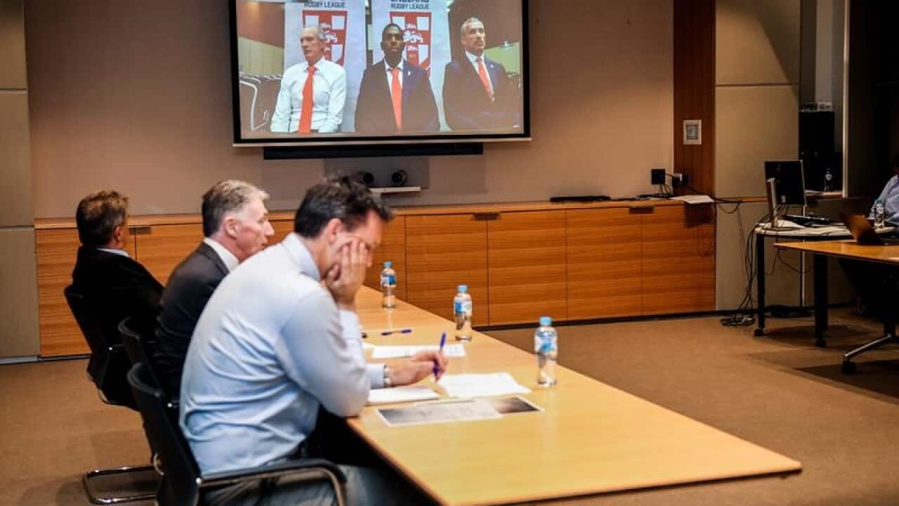 English winger Jermaine McGillvary (centre) appears via videolink