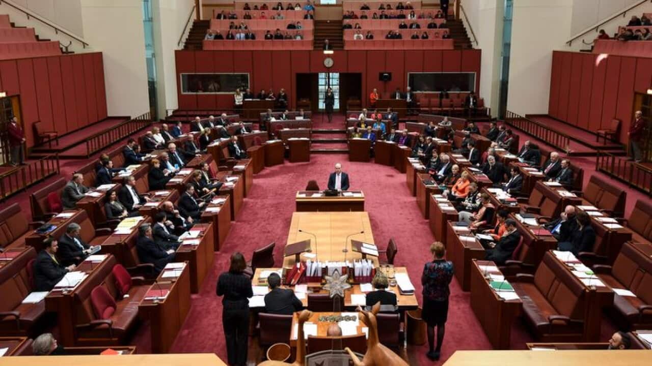 The Senate votes on the Carbon tax repeal bill in the Senate chamber at Parliament House in Canberra, Thursday, July 10, 2014. The governments carbon tax repeal has been voted down by the Senate. (AAP Image/Lukas Coch) NO ARCHIVING