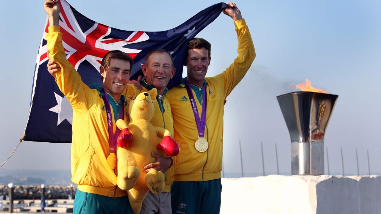 Victor Kovalenko flanked by Matthew Belcher and Malcolm Page after winning Gold at the London Olympics in 2012