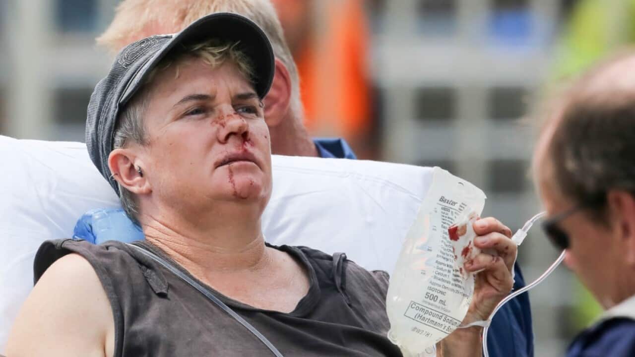 Injured train passengers are seen at Richmond station, Sydney, Monday, January 22, 2018 (AAP)