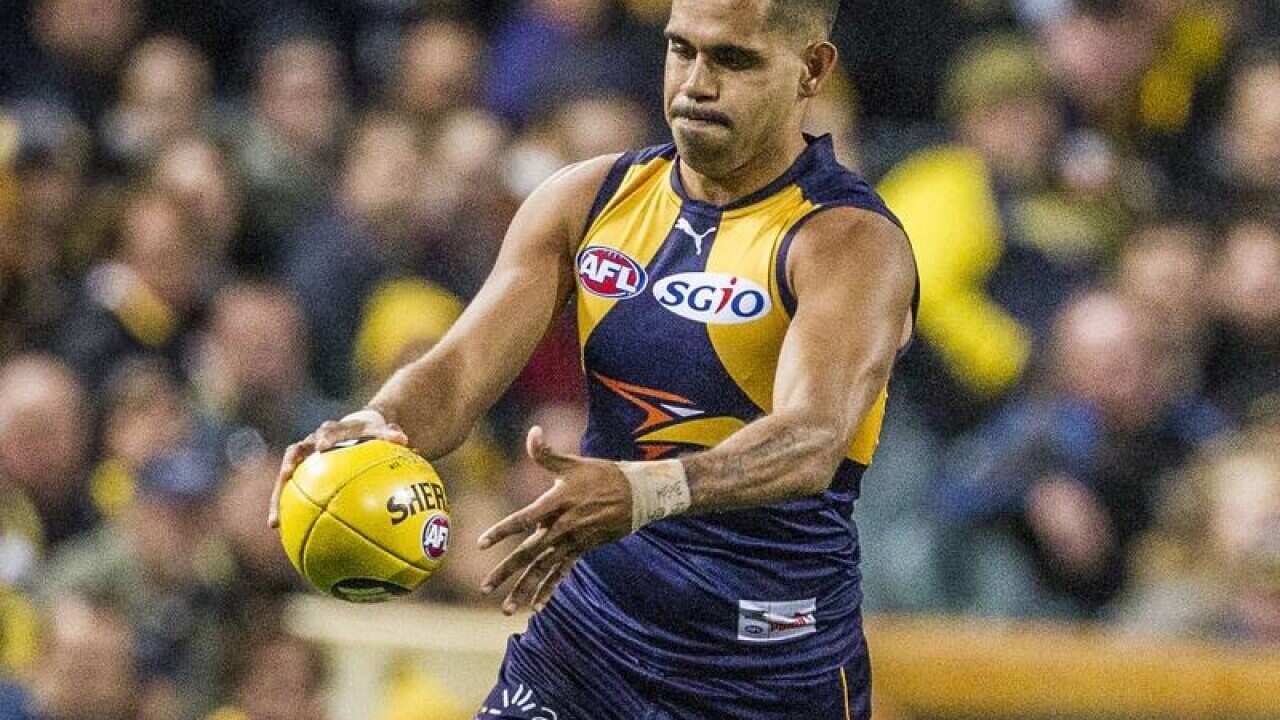 Lewis Jetta of the West Coast Eagles prepares to kick the ball.