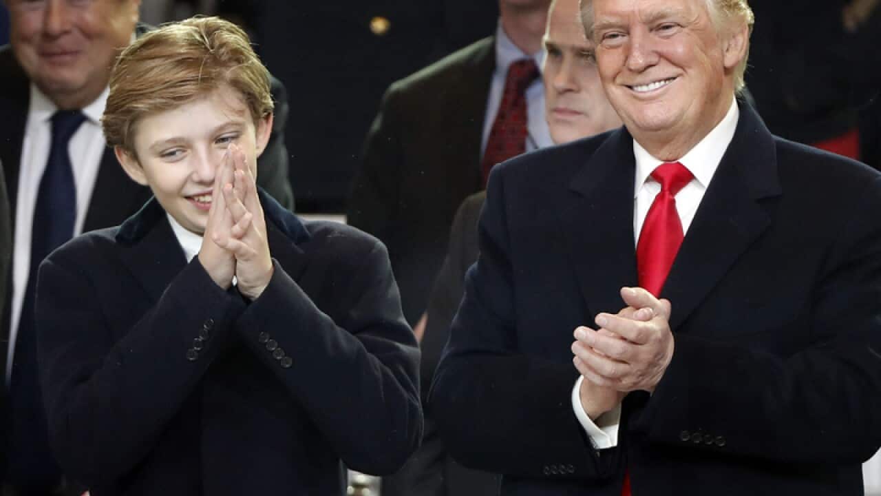 US President Donald Trump with his son Barron