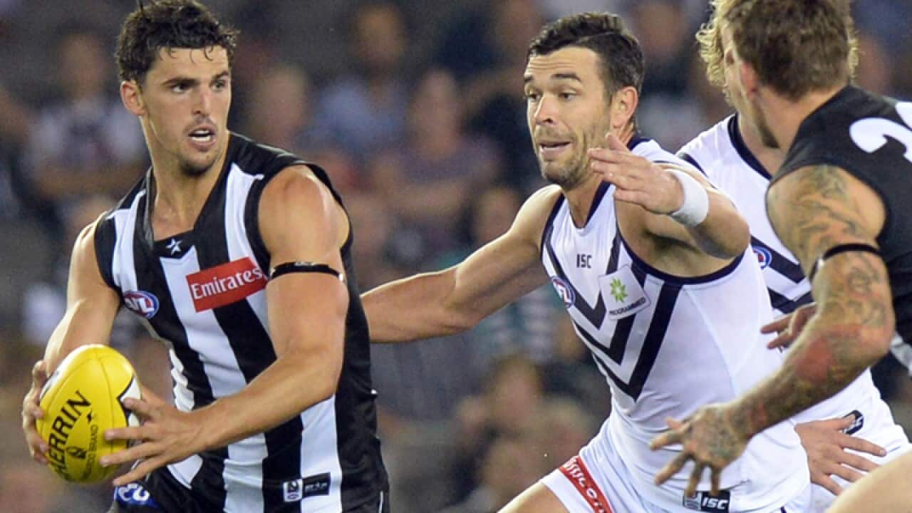 Scott Pendlebury (L) in action